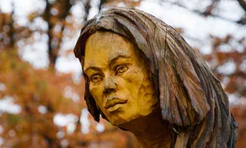 Radosław Szmid - A wooden sculpture in Legends of Cieszyn Silesia Avenue in the Kopczyński's Park